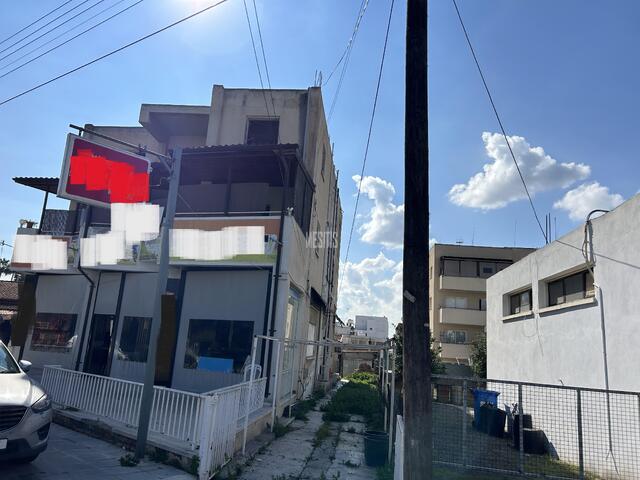 entireBuilding-05e68bbc-8bc7-490f-b9fc-8723054e411c_Wtr.jpeg