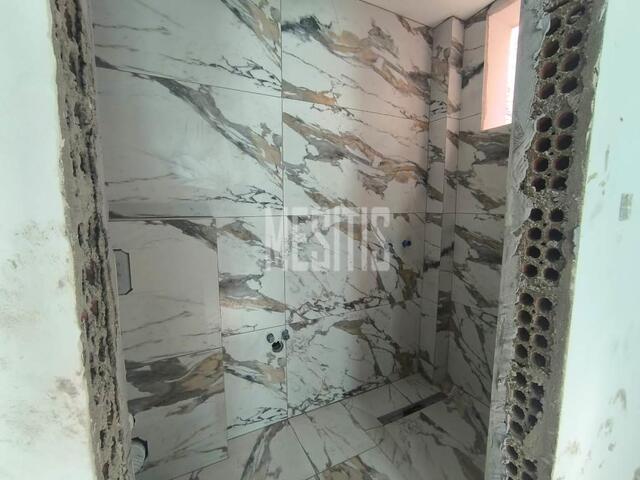 apartment-4d00f1e6-551e-49f0-a78e-8e234dec861e_Wtr.jpg