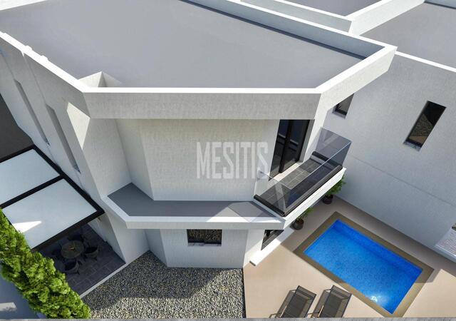 detachedHouse-6b4760ca-418a-49f0-8ced-e5aaee128801_Wtr.jpg